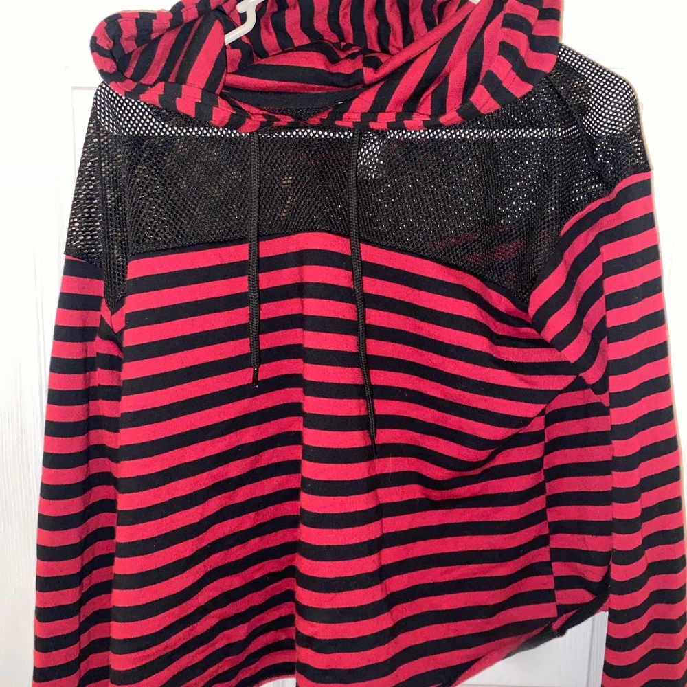 Red and black striped crop top with fishnets